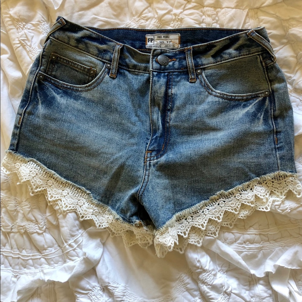 Free People high waisted ruffle jean shorts